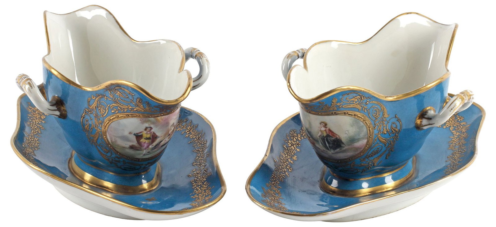 (2) FINE FRENCH SEVRES STYLE PARCEL-GILT BLEU CELESTE PORCELAIN SAUCE BOATS: (lot of 2) Fine French Sevres style parcel-gilt porcelain sauce boats on attached underplates, 19th c., each with unique hand-painted reserves depicting courting couples and forest landscapes, bearing