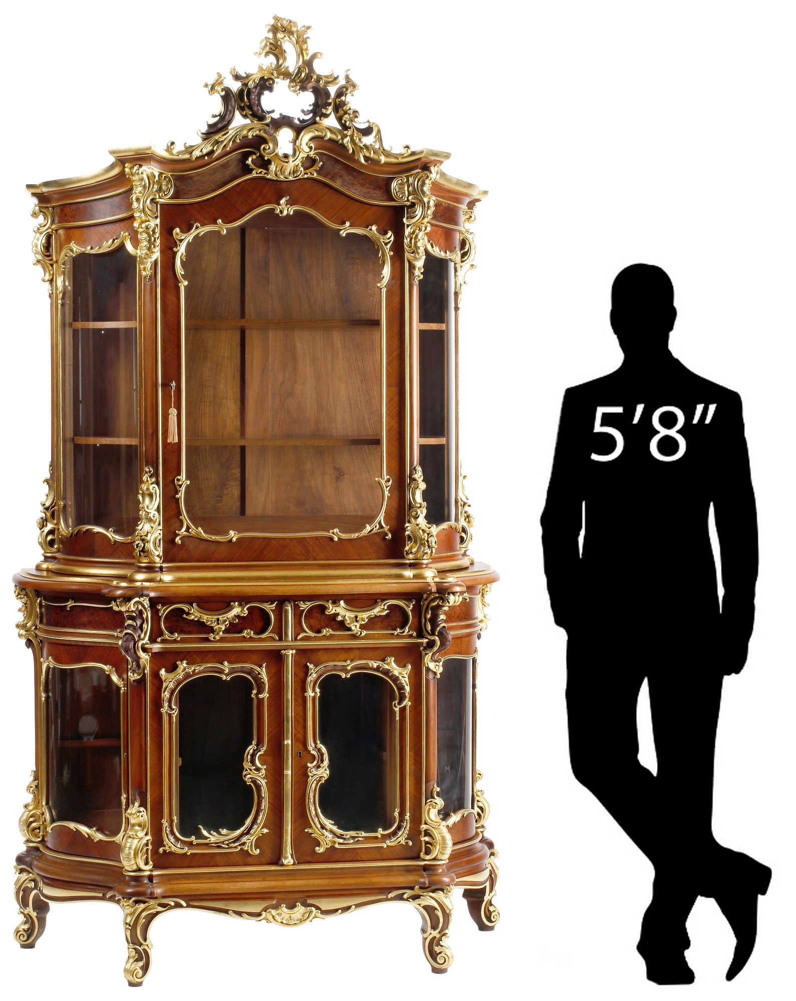 LOUIS XV STYLE PARCEL-GILT MATCHED VENEER DISPLAY CABINET / VITRINE, 92"H: Large Louis XV style matched-veneer display cabinet/ vitrine, with parcel-gilt foliate scrollwork, having pierced crest, above glazed case fitted with two shelves, the lower case with two drawers and 
