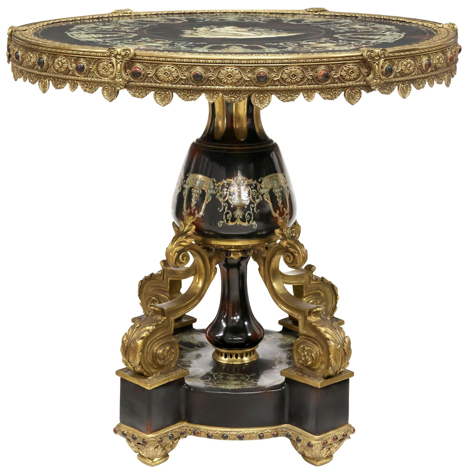 LOUIS XV STYLE ORMOLU-MOUNTED PORCELAIN PEDESTAL CENTER TABLE: Louis XV style bronze dore and porcelain center table, circular top with cabochon-encrusted apron, central hand-painted reserve depicting an allegorical female figure, framed by urns, winged masks, an