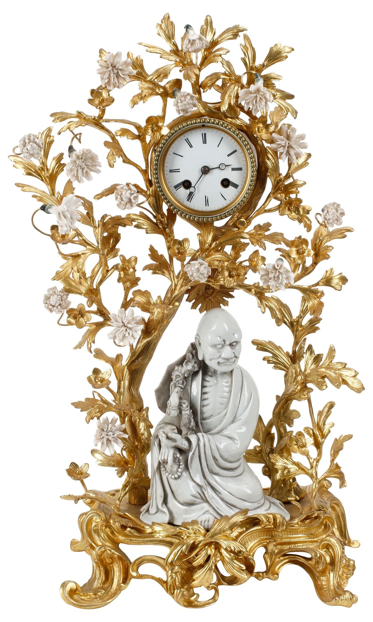 LOUIS XV STYLE ORMOLU & 'BLANC DE CHINE' PORCELAIN FIGURAL MANTEL CLOCK: French Louis XV style bronze dore and "Blanc de Chine" porcelain mantel clock, modeled as a blossoming tree with porcelain flowers, white dial with Roman numeral hour markers, time-and-strike movement
