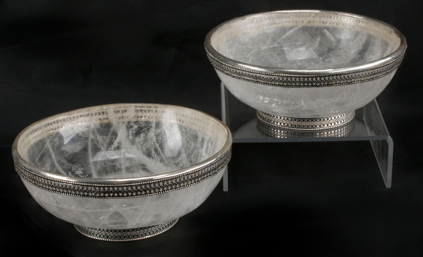 (2) SILVER-MOUNTED ROCK CRYSTAL BOWLS, 10"DIAM: (pair) Silver (content unknown) mounted rock crystal bowls, each with beaded trim and repeating floral roundels, on footed base, approx 4"h, 10"diam, 11.25lbs total