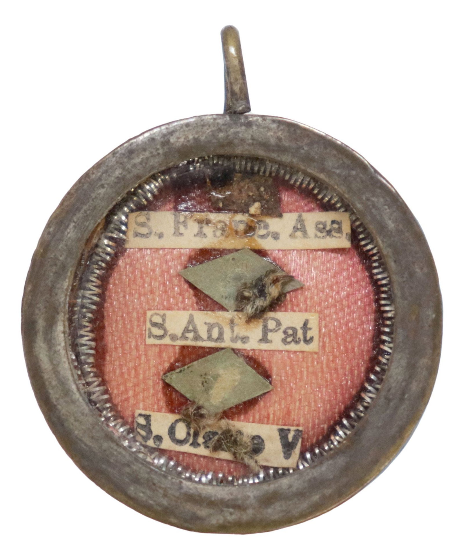 THECA CONTAINING 3 RELICS OF FRANCISCAN SAINTS ANTHONY, FRANCIS & CLARE OF ASSISI: Religious gold-tone metal theca reliquary, housing (three) first-class relics of Saints Francis of Assisi, Anthony of Padua, and Clare of Assisi, grouped together to represent the spiritual core of th