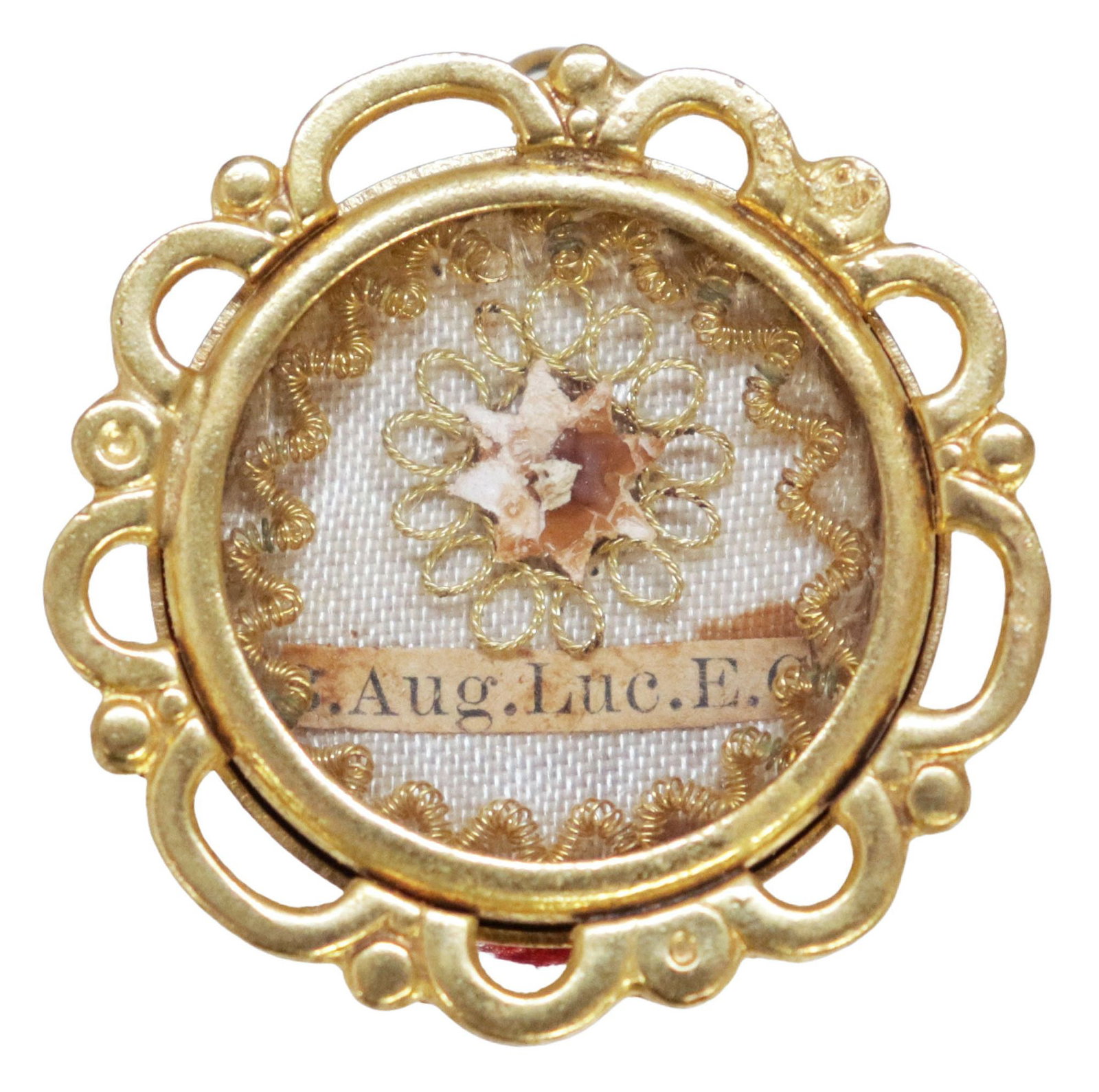 1ST-CLASS RELIC OF SAINT AUGUSTINE IN GILT-METAL THECA RELIQUARY: Religious first-class relic of Saint Augustine (Bishop of Hippo, Theologian, Confessor, and Doctor of the Church, Italian, 354-430), housed in a gold-tone metal theca reliquary, with scalloped border,