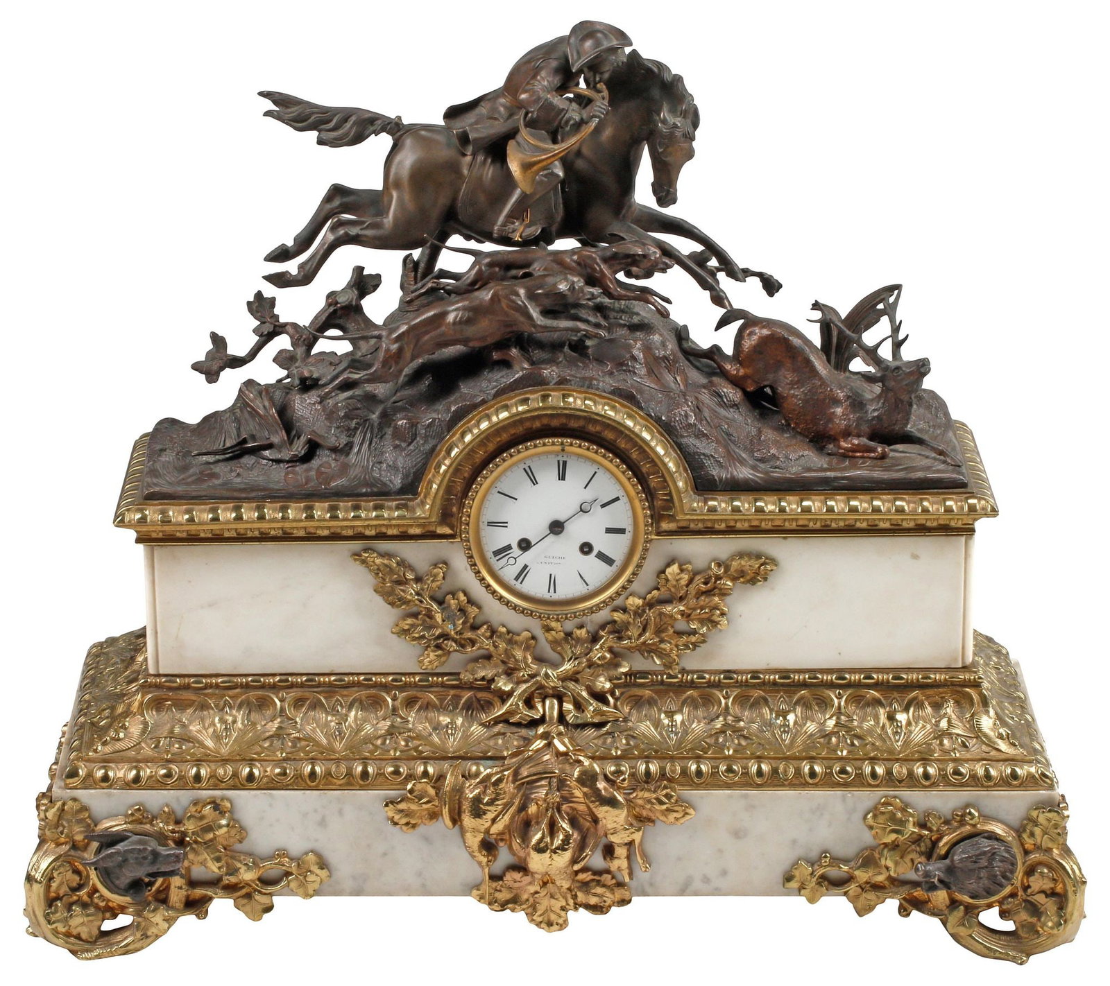FRENCH LOUIS XVI STYLE BRONZE & MARBLE EQUESTRIAN HUNT SCENE MANTEL CLOCK: Fine French Louis XVI style ormolu-mounted Carrara marble mantel clock, 19th c., surmounted by a patinated bronze figural sculpture, depicting a rider with horn and sprinting hounds engaged in a stag 