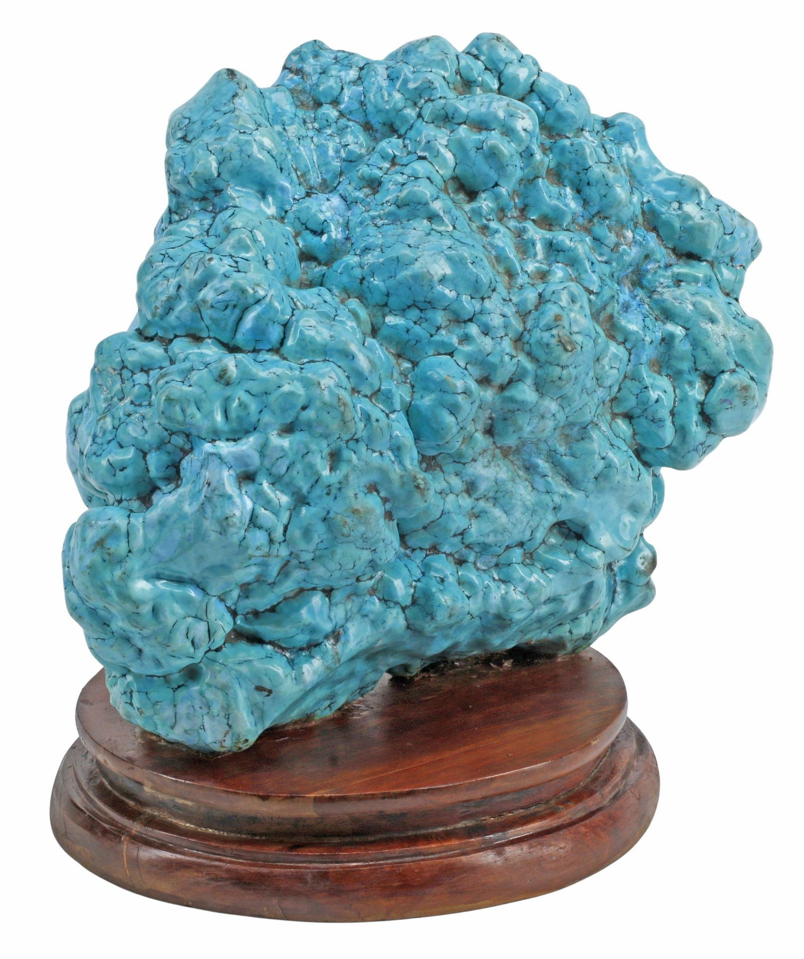 LARGE DYED TURQUOISE NUGGET SPECIMEN ON WOOD STAND, 13.5"H: Large turquoise nugget specimen, likely dyed, rising on wood base, nugget only: approx 11.5"h, 14"w, 736.75"d, overall: approx 13.5"h, 14"w, 10"d, 36.75lbs