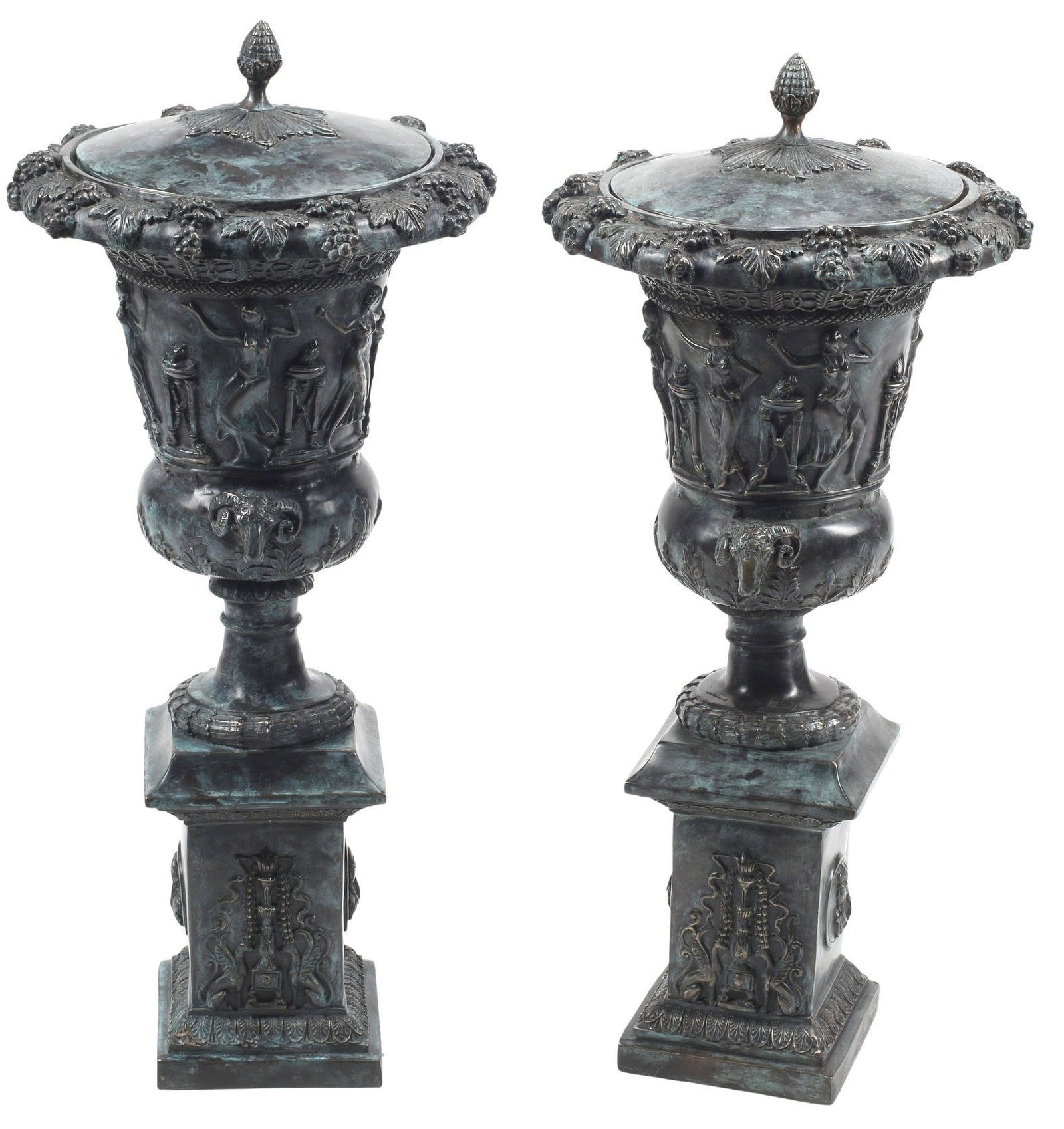 (2) NEOCLASSICAL STYLE VERDIGRIS PATINATED BRONZE COVERED URNS, 31"H: (pair) Large Neoclassical style verdigris-patinated bronze covered urns, each having pineapple finial and grape vine trim, over figural frieze and dual ram's head handles, rising on stepped plinth wit