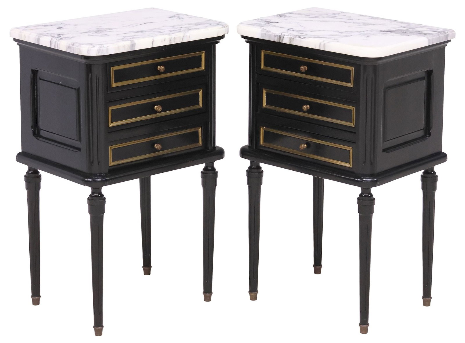 (2) FRENCH LOUIS XVI STYLE MARBLE-TOP BLACK-PAINTED NIGHTSTANDS: (pair) French Louis XVI style black-painted nightstands, 20th c., each with beveled-edge marble top, over three drawers with gilt-metal trim, on tapering fluted legs and brass cap feet, approx 26.25"h