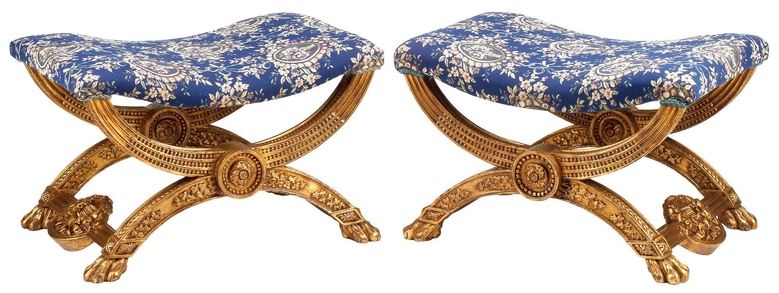 (2) NEOCLASSICAL STYLE UPHOLSTERED GILT CURULE BENCHES: (pair) Neoclassical style gilt-painted wood curule benches, each in floral-patterned fabric upholstery, rising on stretcher-joined legs with paw feet, approx 18"h, 29"w, 20"d