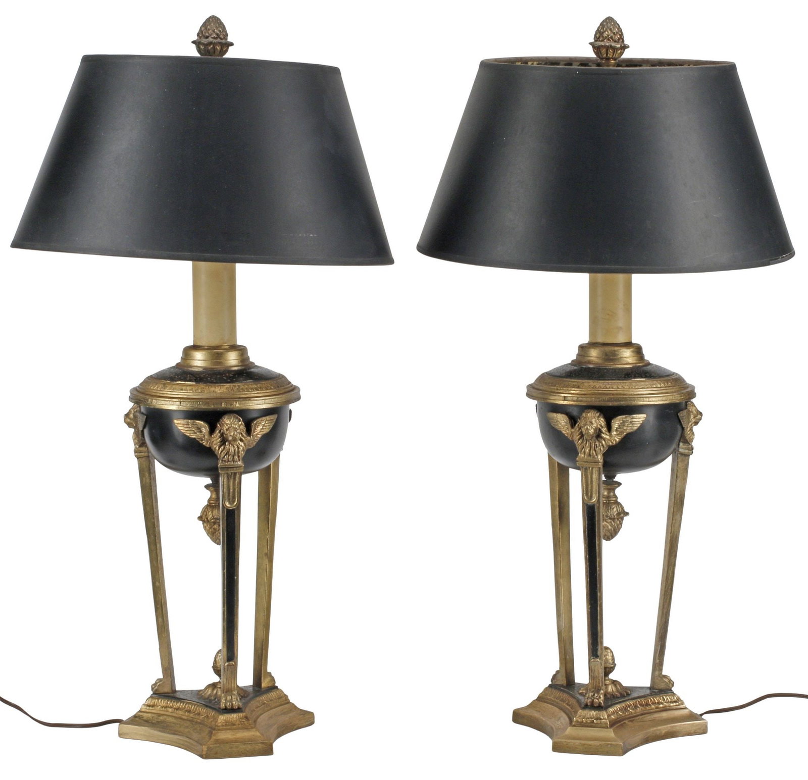 (2) CHAPMAN EMPIRE STYLE PARCEL-GILT TABLE LAMPS WITH SHADES: (pair) Empire style gilt-metal two-light table lamps, Chapman, late 20th c., each with winged lion masks and pineapple finials, rising on tripartite base, accompanied by shade, retaining adhesive make