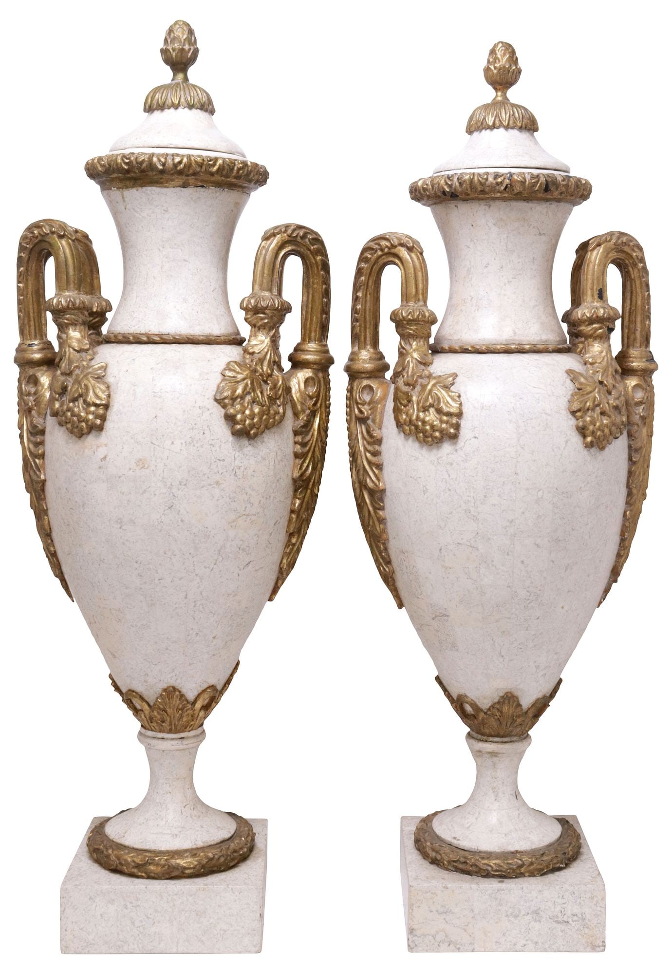(2) NEOCLASSICAL STYLE TESSELLATED STONE PARCEL-GILT URNS: (pair) Neoclassical style tessellated stone urns in the form of cassolettes, late 20th c., each with affixed cover surmounted by stylized pineapple finial, tapering form with gilt composition foliate 