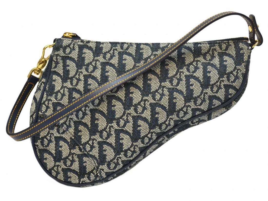 DIOR BLUE MONOGRAM CANVAS SADDLE ACCESORY POUCH: Christian Dior navy blue monogram 'Saddle' accessory pouch with short strap and gilt hardware, bag: approx 6.5"h, 9.5"w, 1.25"d, .25lb Start Price: $100.00