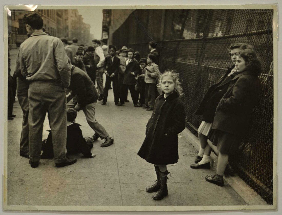 PHOTOGRAPHY, "CHILD WITH POLIO", WALTER ROSENBLUM: Unframed matted gelatin silver print, ink signed, titled, dated, on verso "Child with Polio, Pitt Street, New York, 1938, Walter Rosenblum (New York, b. 1919, tear at upper right, sight: 7.5"h, 10"w,