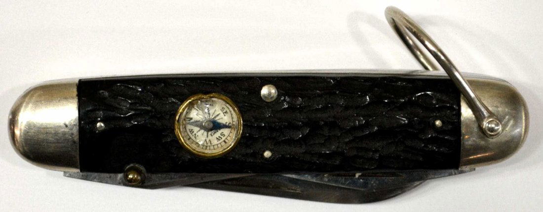 CATTARAUGUS COMPASS CAMP KNIFE, FOUR BLADES: Cattaraugus Compass Camp folding knife, two knife blades, can opener, awl, chip in compass glass, 3.7/8" closed Start Price: $50.00