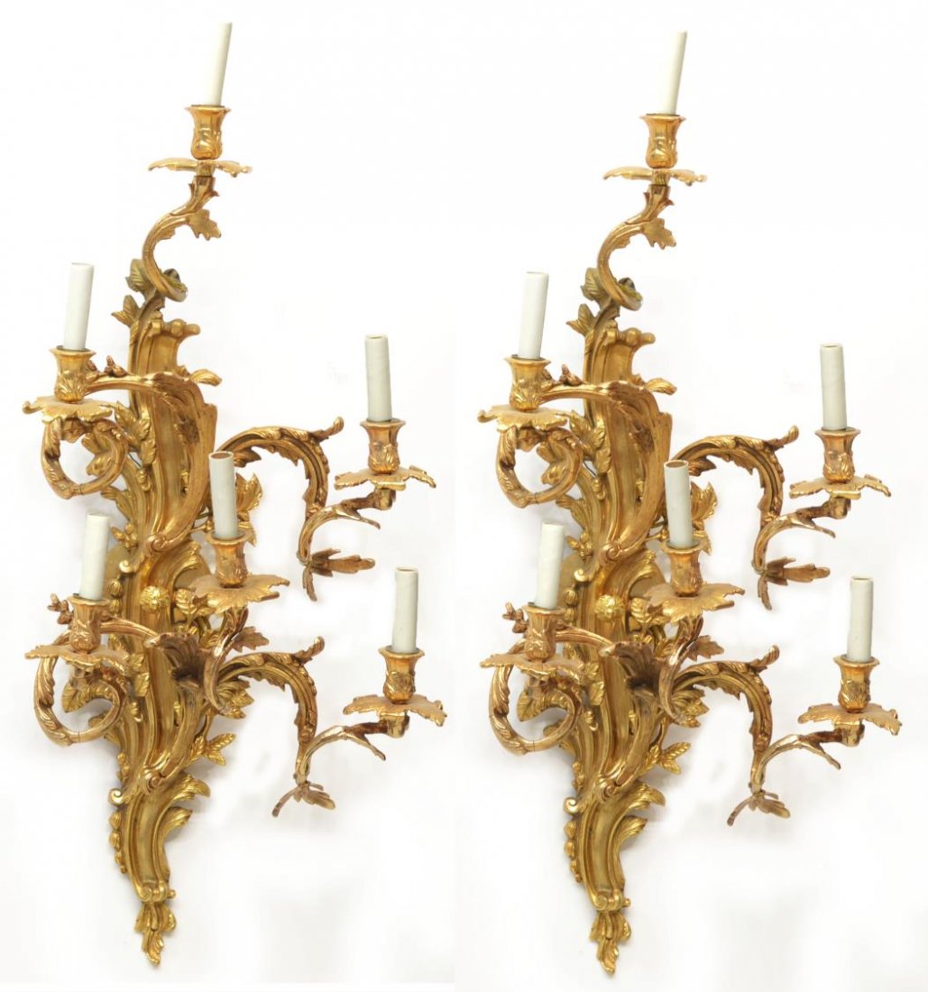 (PAIR) LOUIS XV STYLE DORE BRONZE WALL LIGHTS: (pair) Louis XV style Dore bronze wall sconces, six scrolling arms with foliate accents terminating in lights, the whole having foliage and flowers, some loss to candle covers, restorations to arms, a