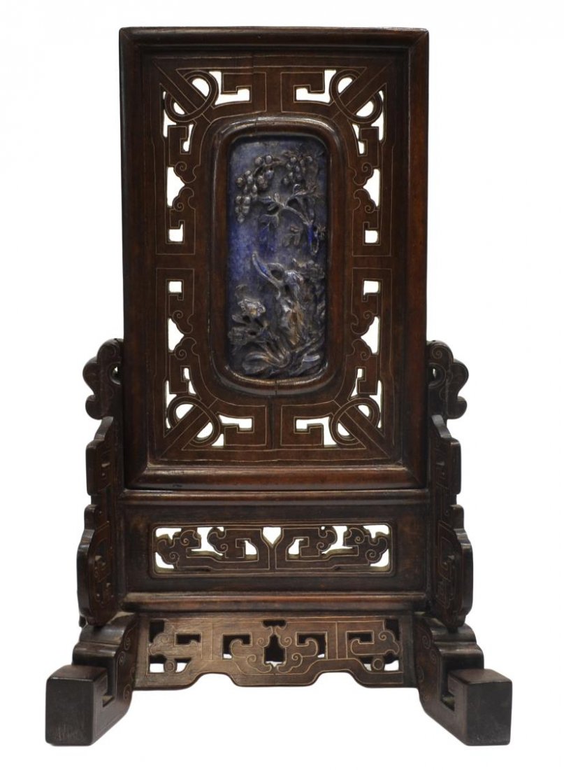 CHINESE SILVER-WIRE INLAID & LAPIS TABLE SCREEN: Chinese silver-wire inlaid reticulated wood table screen, 20th c., centering a carved lapis lazuli plaque depicting flowering and fruiting plants, overall: 9"h, 5.75"w, 1lb Start Price: $150.00