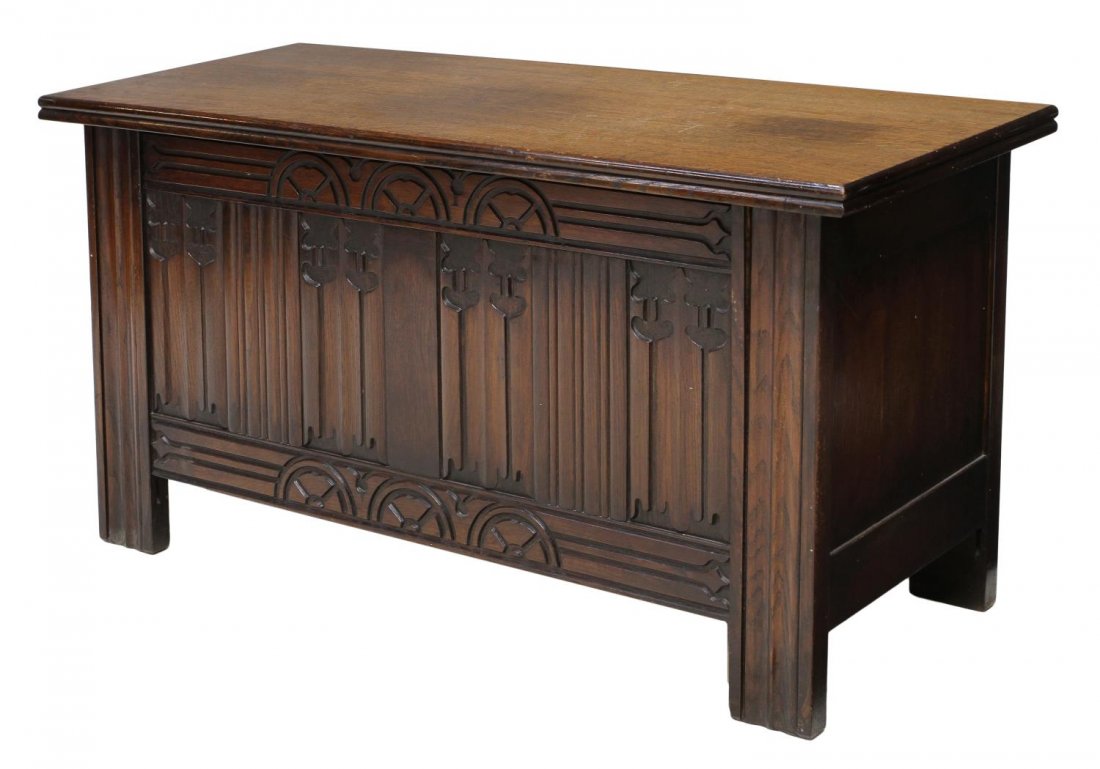 BRITISH LINEN FOLD CARVED OAK STORAGE CHEST: English oak blanket chest, the case of rectangular form carved to the front with linen fold detail and running ornamentation, open interior storage, retaining tag 'Tomorrow Furniture', approx 20.5"h, 