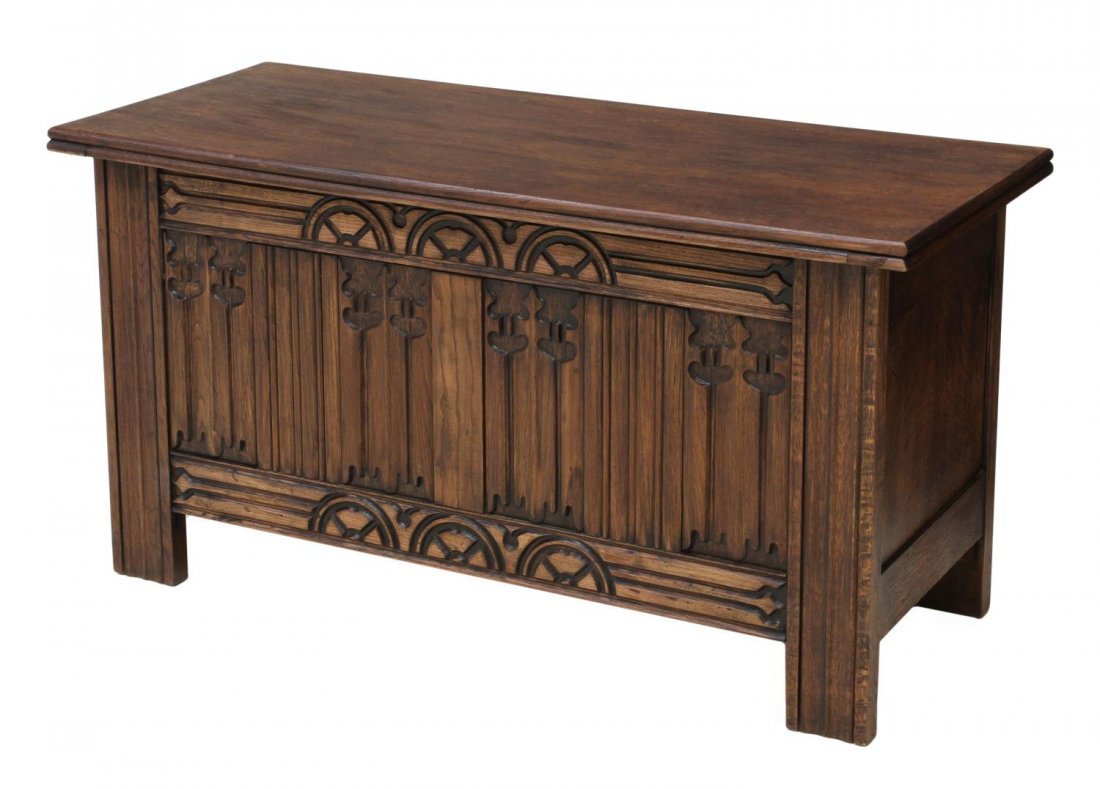 BRITISH LINEN FOLD CARVED OAK STORAGE CHEST: English oak blanket chest, the case of rectangular form carved to the front with linen fold detail and running ornamentation, open interior storage, retaining tag 'Tomorrow Furniture', approx 20.5"h, 