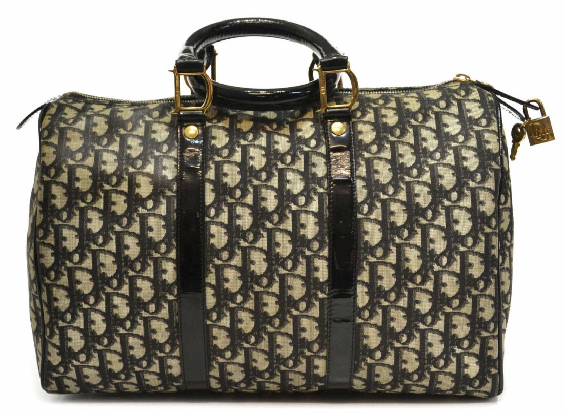 DIOR VINTAGE BOSTON MONOGRAM CANVAS HANDBAG: Dior black and white vintage boston monogram canvas handbag, two interior pockets, patent hanles and trim accents, accompanied by a dust bag and key and lock, bag: approx 9.25"h, 14.5"w, 7"d, .75lb St