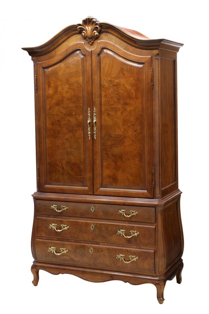 HENREDON TV ARMOIRE: Henredon walnut finish TV armoire having an arched cornice over two doors opening to a shelf over two drawers, three lower bombe style drawers, all rising on short cabriole legs with scrolled feet, 86