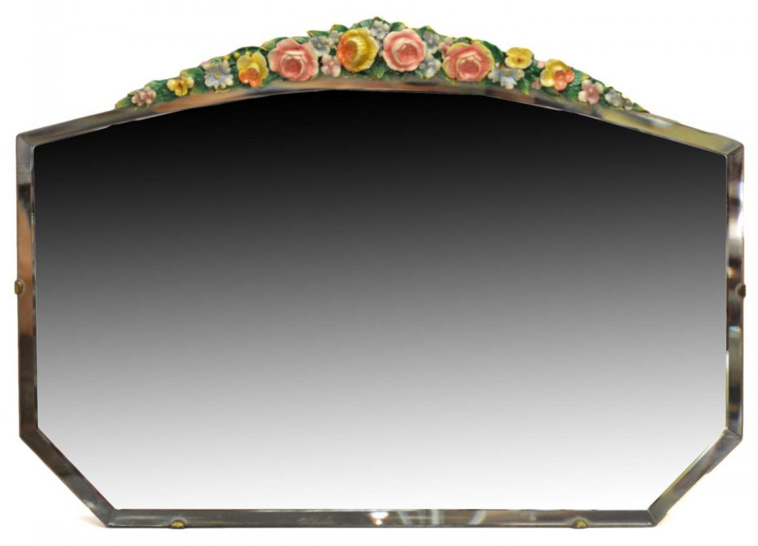 ENGLISH POLYCHROME FLORAL BARBOLA MIRROR: English Barbola mirror, a crest of polychrome carved flowers over the mirror with beveled edge, some splits to wood, approx 14.25"h, 21"l, 9lbs Start Price: $50.00