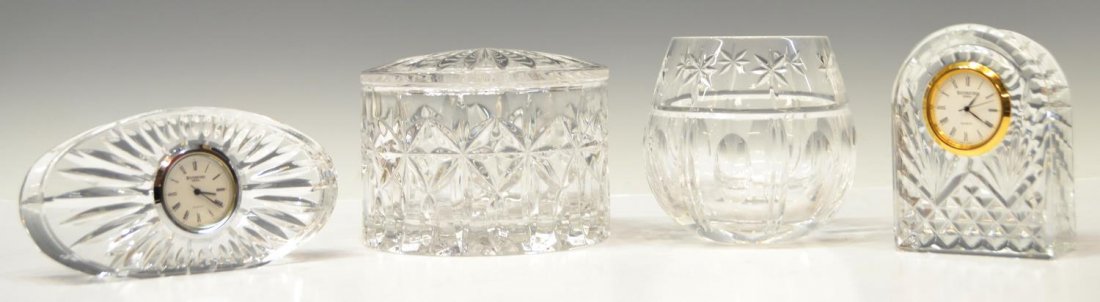 (4) WATERFORD CRYSTAL TABLE CLOCKS & COVERED BOX: (lot of 4) Collection of Waterford crystal: (1) diminutive table clock with gilt metal rim, 3.5"h, 2.5"w, 1.25"d; (1) covered box in Balmoral pattern, 2.75"h, 4.25"diam; (1) oval table clock, approx 2