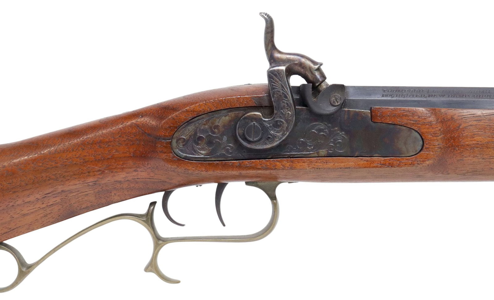 THOMPSON HAWKEN 50 CALIBER PERCUSSION RIFLE: Thompson Center Arms Hawken Muzzle Load Percussion Rifle, .50 caliber, 29" octagonal barrel, blade front sight, ram rod, adjustable rear sight, foliate scrolling at hammer and lock plate, brass trigge