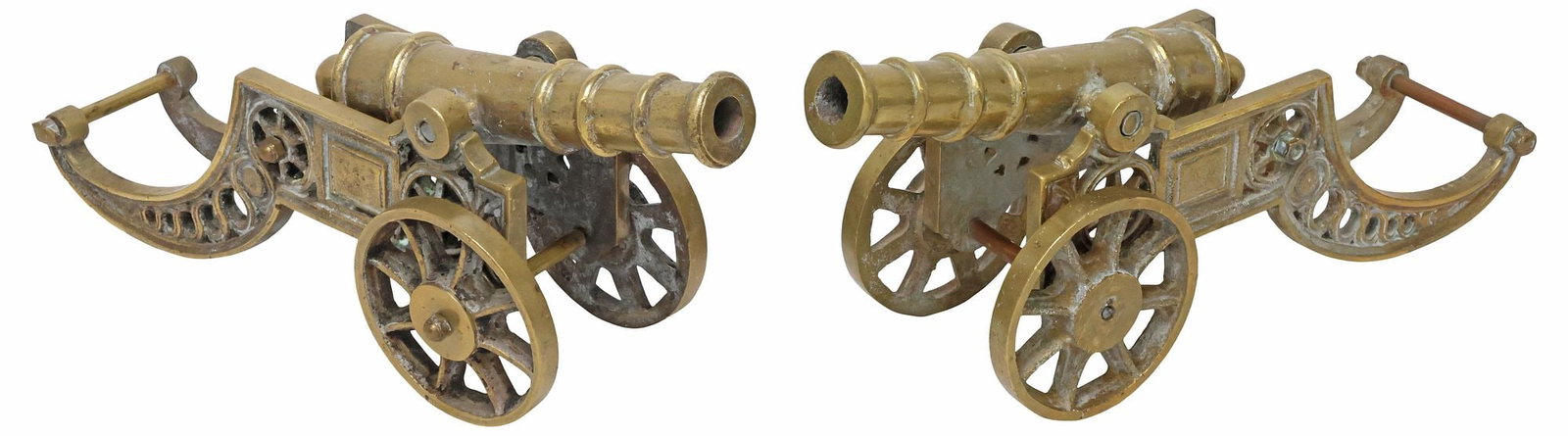 (2) ENGLISH BRASS MINIATURE MODELS OF CANNONS & CARRIAGES: (pair) Decorative English brass models of cannons, each having pierced carriage with repeating scroll motifs, functioning wheels, approx 8"h, 17.5"w, 5.5"d, 28lbs total