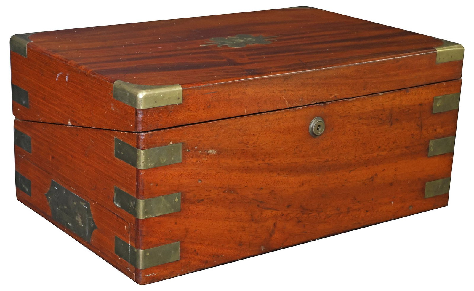ENGLISH BRASS-BOUND MAHOGANY WRITING SLOPE / CAMPAIGN TRAVEL DESK: English mahogany writing slope/ campaign travel desk, late 19th c., the rectangular case with brass corners, central shaped cartouche with triple monogram, inset campaign handles to either side, the i