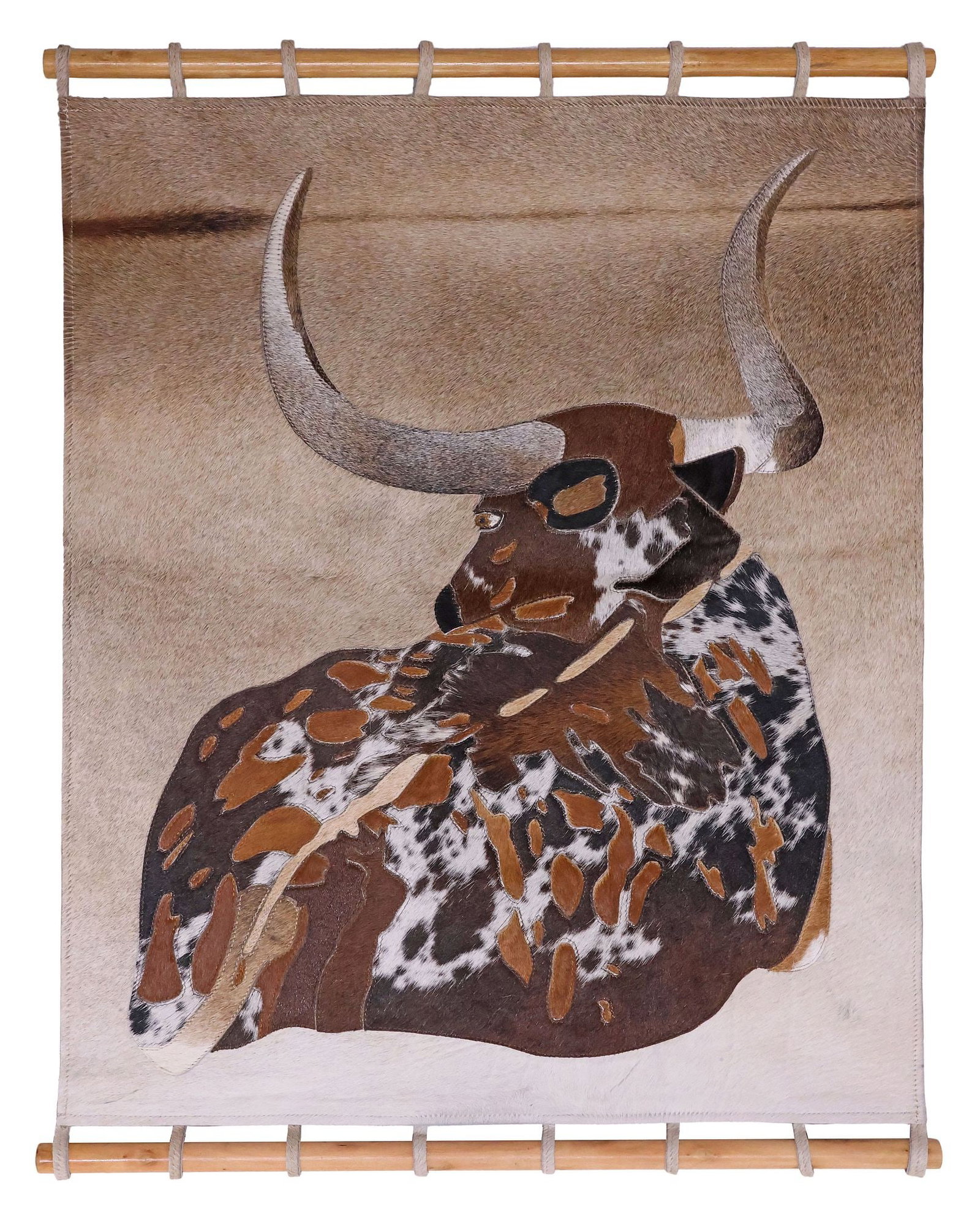 AFRICAN STITCHED COWHIDE WALL-HANGING, TEXAS LONGHORN, 38"H: Decorative African stitched hide wall-hanging animal picture, Babylon, depicting a seated Texas longhorn in Nguni hide, on ombre background, maker's mark on back, approx 38"h, 29.5"w, 6lbs **Provenanc