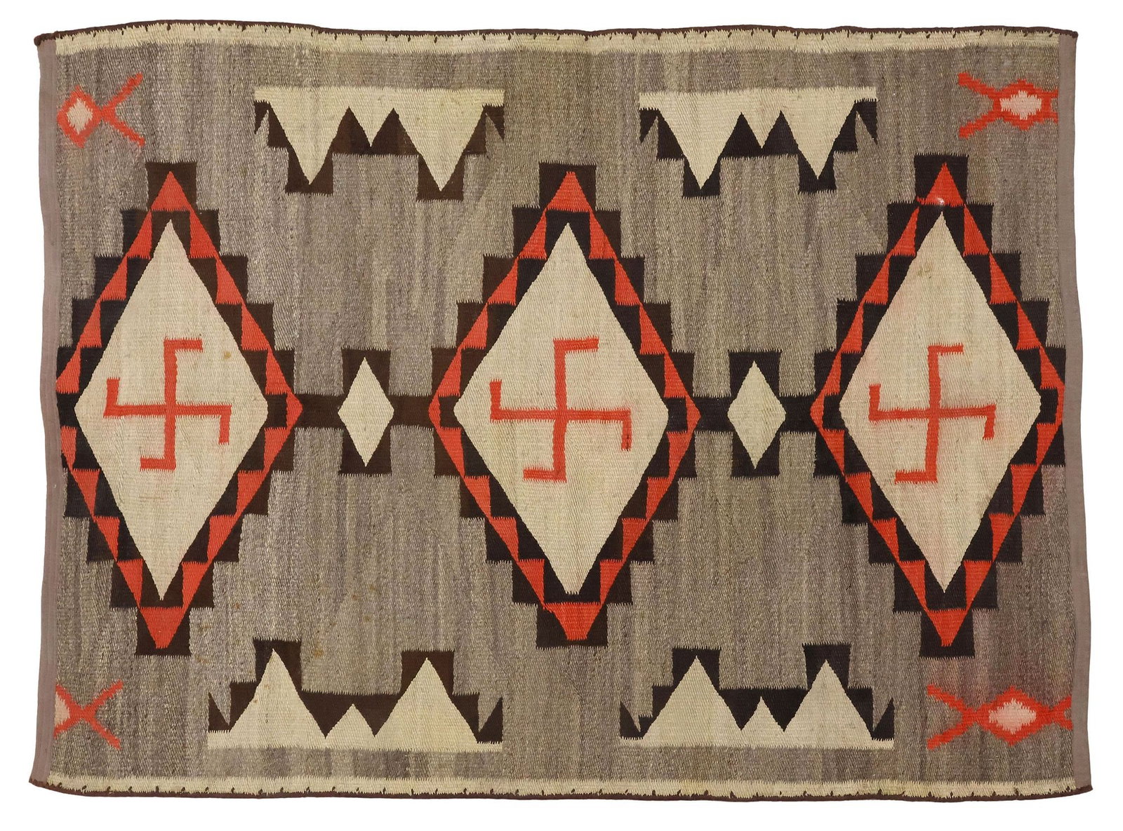 NATIVE AMERICAN NAVAJO WOOL 'WHIRLING LOGS' RUG, 4'11" X 3'9": Native American Navajo handspun wool rug, c.1920s, with whirling log symbols, cut down/ reduced, approx 4'10.75"l, 3'9.25"w **Provenance: Curated estate merchandise from long-time antiques dealers**