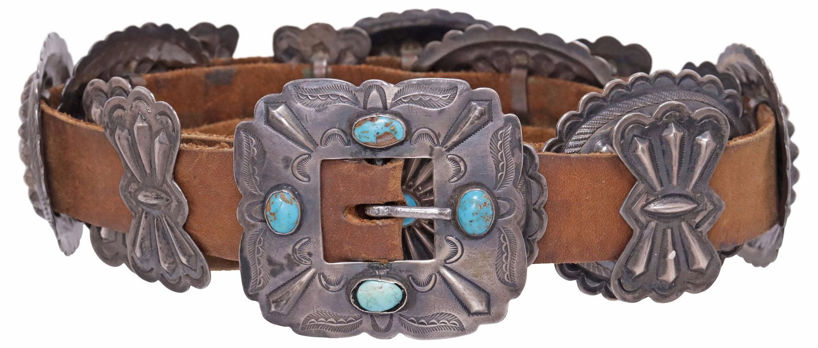 NATIVE AMERICAN TURQUOISE & STAMPWORKED SILVER CONCHO BELT: Native American silver (content unknown) and turquoise concho belt, shaped buckle with stampwork feathers and geometric motifs, (seven) oval conchos, each having bezel-set turquoise cabochon in radiat