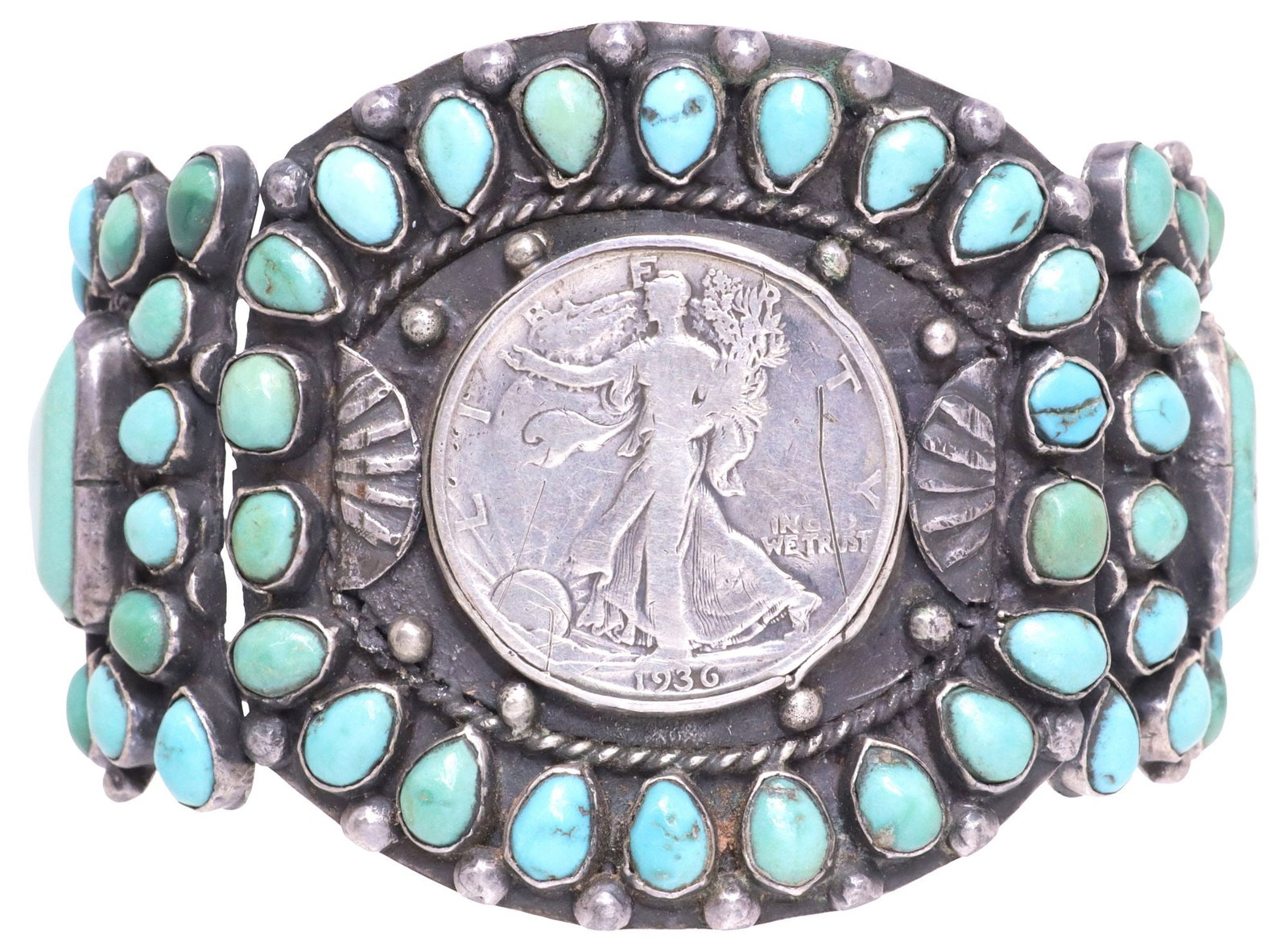 NATIVE AMERICAN SILVER & TURQUOISE 1936 WALKING LIBERTY HALF DOLLAR CUFF, 114.3 GRAMS: Large Native American silver (content unknown) cuff bracelet, split shank centering bezel-set Walking Liberty half dollar, minted 1936, framed by (twenty-two) oval turquoise cabochons, shaped setting 