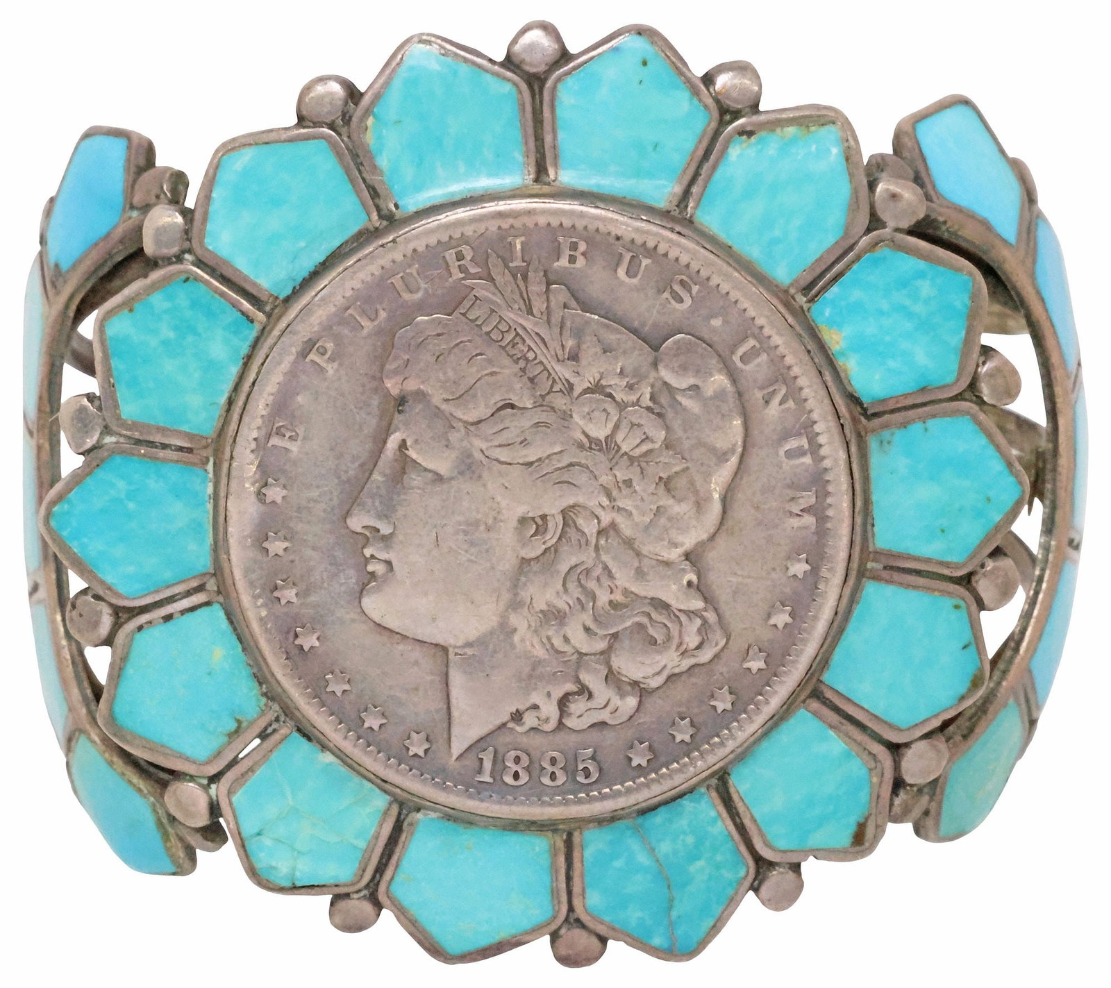 NATIVE AMERICAN SILVER & TURQUOISE CUFF BRACELET WITH 1885 MORGAN DOLLAR: Native American silver (content unknown) cuff bracelet, centering an 1885 Morgan silver dollar, encircled by petal-form turquoise inlay, on a split shank cuff, (two) stones intact with restoration, (t