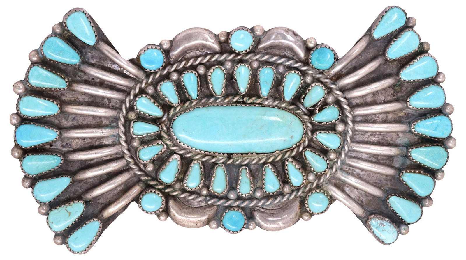LARGE NATIVE AMERICAN SILVER & PETIT POINT TURQUOISE CABOCHON BROOCH: Substantial Native American silver (content unknown) and petit-point turquoise brooch, shaped plaque with fanned terminals, with (forty-four) bezel-set turquoise cabochons, twisted rope trim and cresc