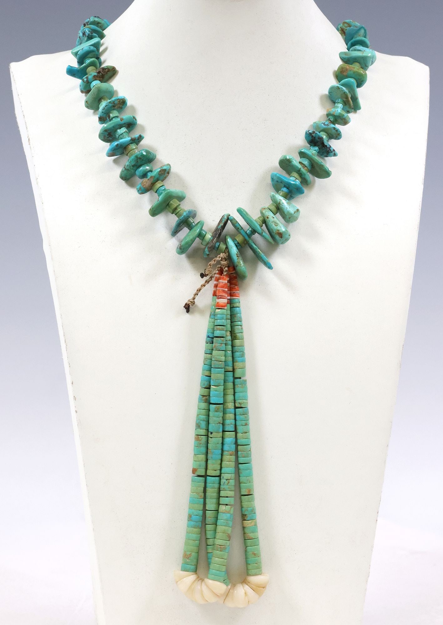 LARGE NATIVE AMERICAN PUEBLO TURQUOISE BEAD JACLA NECKLACE: Native American Pueblo beaded Jocla necklace, having graduated turquoise nugget beads and disc-form spacers, accented with shell heishi beads, on tied cord, Jocla pendant with tapering shell beads, ne