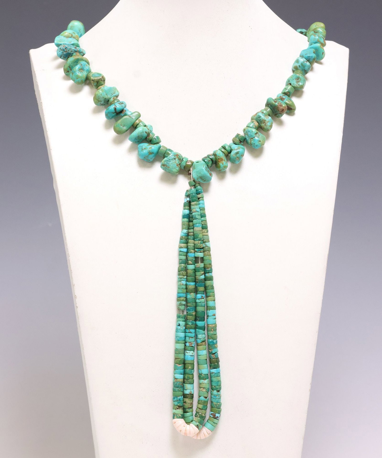 NATIVE AMERICAN PUEBLO TURQUOISE BEADED JACLA NECKLACE: Native American Pueblo beaded Jocla necklace, having graduated turquoise stones and disc-form spacers, accented with shell heishi beads, on tied cord, Jocla pendant with tapering shell beads, necklace