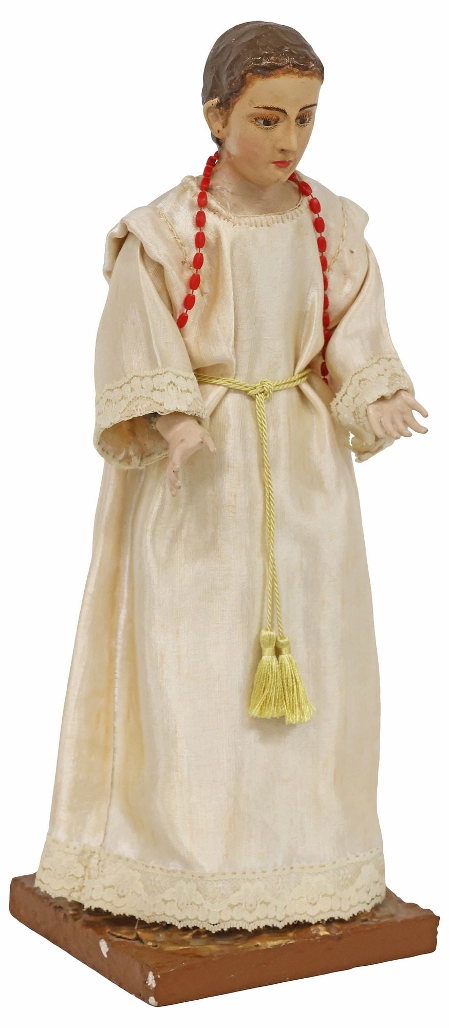 POLYCHROME-PAINTED SANTO / ALTAR FIGURE, VIRGIN MARY, BOLIVIA: Folk art polychrome-painted santo/ altar figure, Virgin Mary, Bolivia, papier-mache and composite body, draped in lace-trimmed cream fabric robes, accompanied by red beaded ornaments, rising on wood b