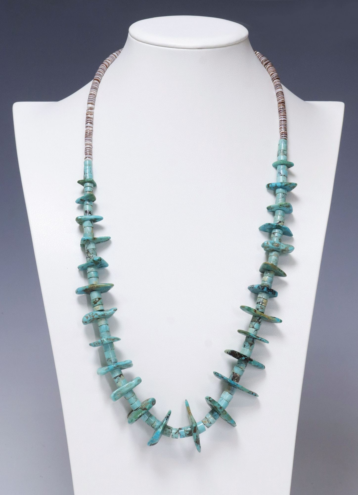 NATIVE AMERICAN TURQUOISE SLAB & HEISHI BEADED NECKLACE: Native American beaded necklace, freeform turquoise slabs, interspersed with disc-form turquoise beads, terminating in heishi beads and barrel screw clasp, approx 13.75"l (laying flat), 88.5 grams **P
