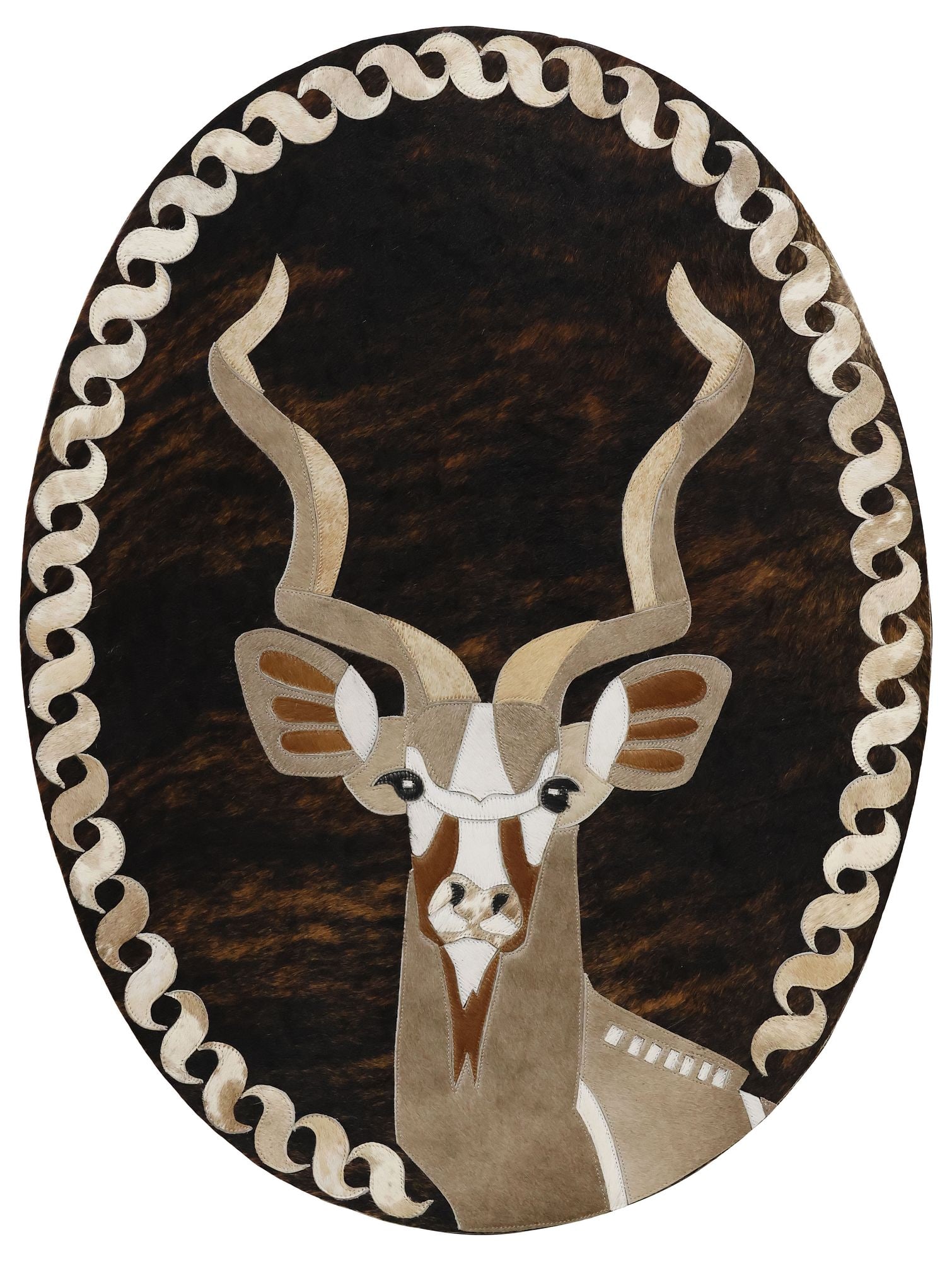 AFRICAN STITCHED COWHIDE WALL-HANGING ON BOARD, KUDU ANTELOPE, 39.5"H: Decorative African stitched hide wall-hanging animal picture, Kudu, depicting an antelope with forward-facing gaze, on ovular brindle hide background with ornamental border, adhered to wood backboard,