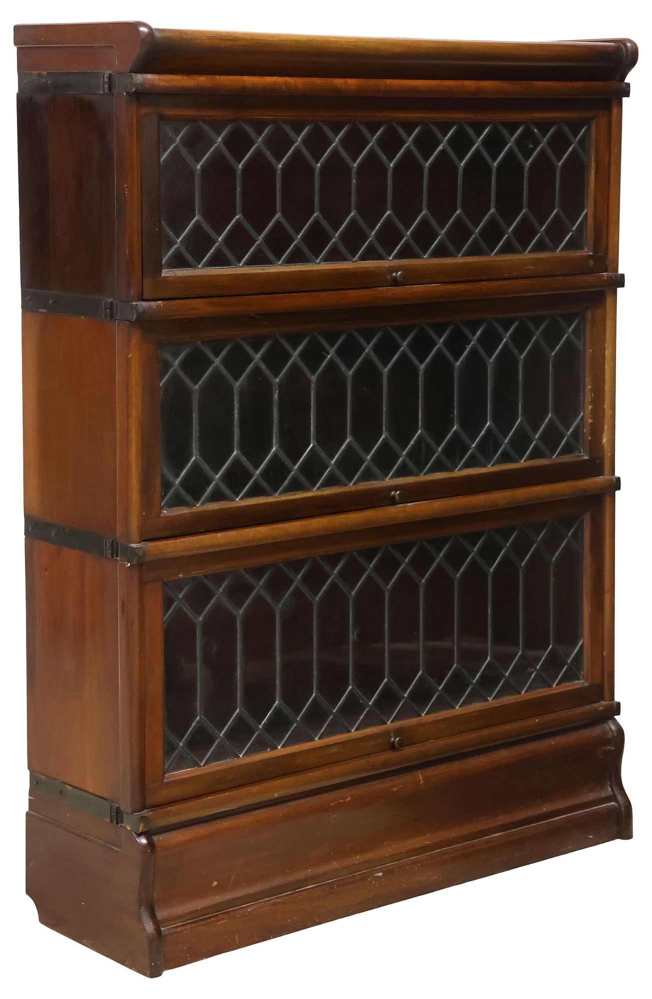 ENGLISH MAHOGANY & LEADED GLASS 3-STACK BARRISTER'S BOOKCASE: English mahogany lawyer's stacking bookcase, early 20th c., comprising three tiers with retractable leaded glass doors, sides bound with patinated metal strapping, on conforming plinth base, approx 45
