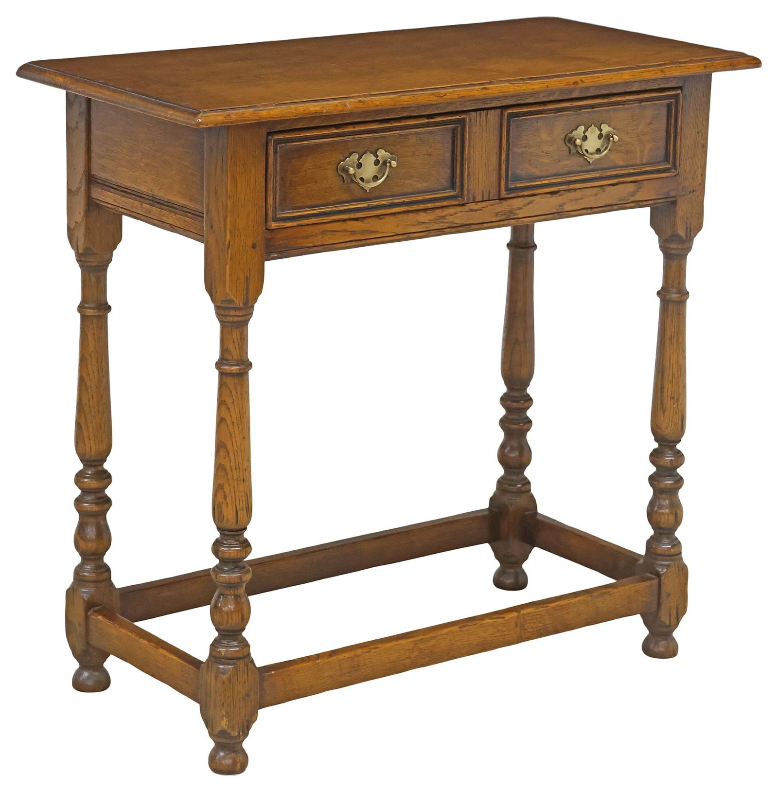 ENGLISH EDWARDIAN PANELED OAK SIDE TABLE: English Edwardian oak table, early 20th c., rectangular top, over two paneled drawers, rising on columnar supports joined by box stretcher, ending on bun feet, approx 28.5"h, 30"w, 14.25"d