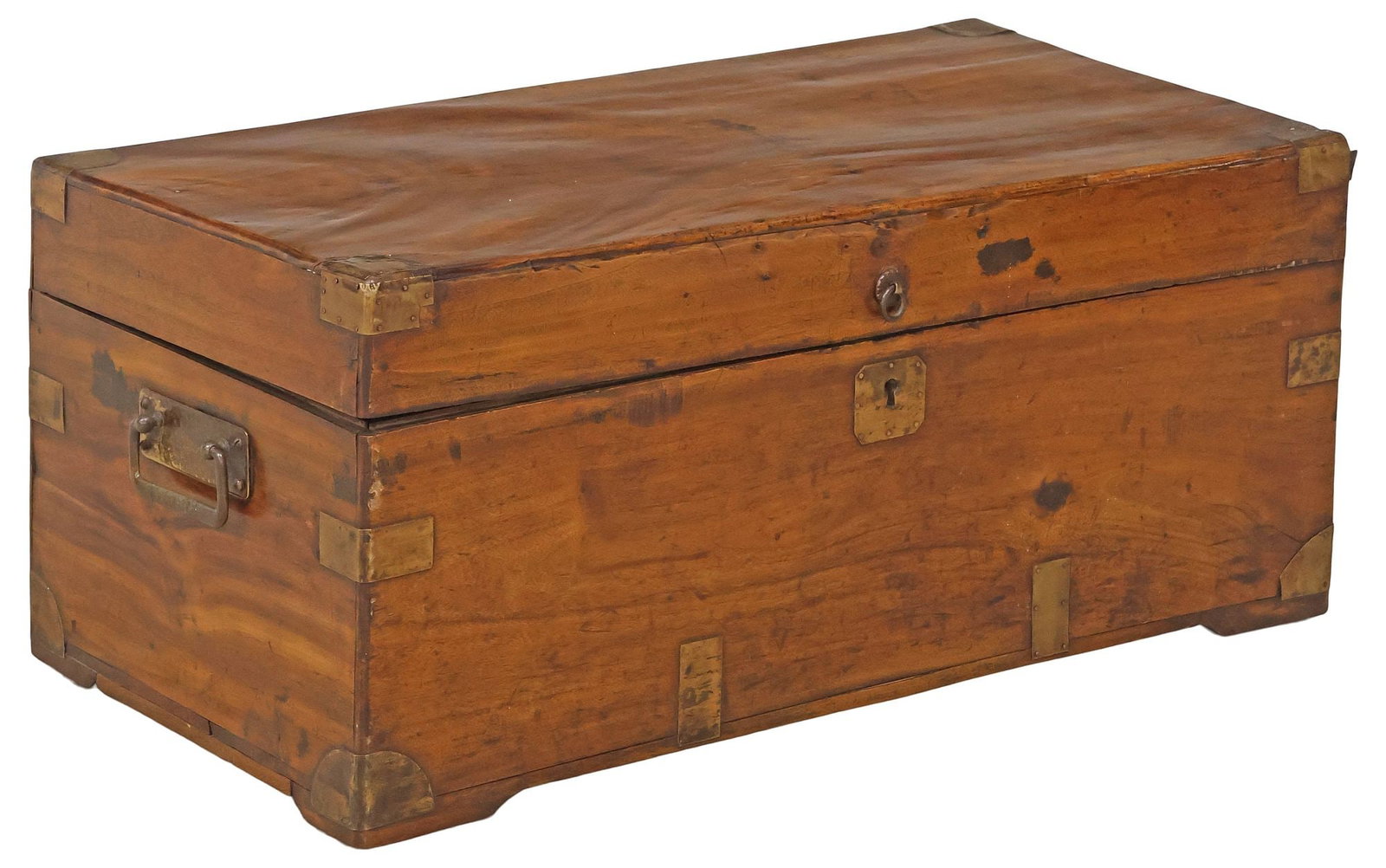 BRITISH COLONIAL BRASS-BOUND CAMPHOR CAMPAIGN CHEST: British Colonial camphor campaign chest/ storage trunk, 19th c., brass-bound case with pair of hammered side handles, hinged lid revealing open interior storage, approx 11.5"h, 27"w, 13.75"d, 19.5lbs