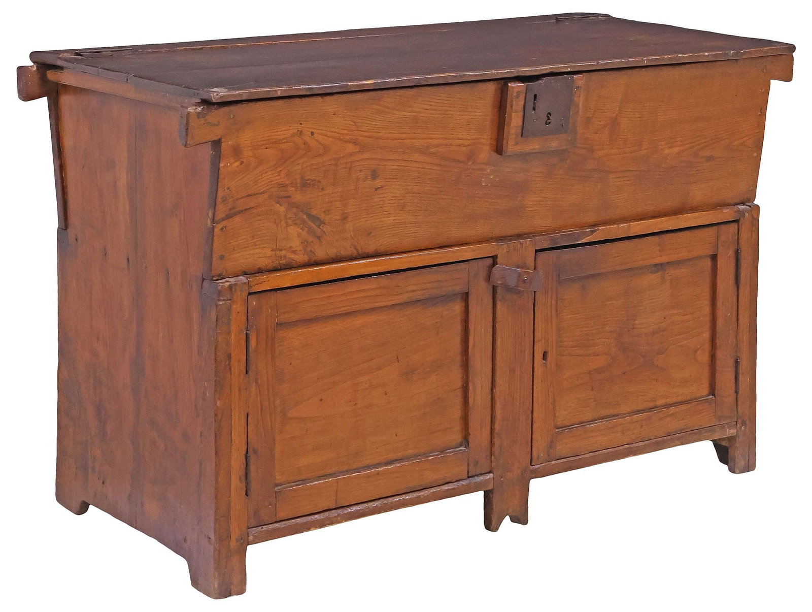 RUSTIC ITALIAN OAK LIFT-TOP GRAIN / FLOUR MADIA CABINET, 18TH C.: Rustic Italian oak grain/ flour cabinet or madia, late 18th c., hinged top revealing open interior storage, over angled front panel, and pair of paneled cabinet doors enclosing additional open storage
