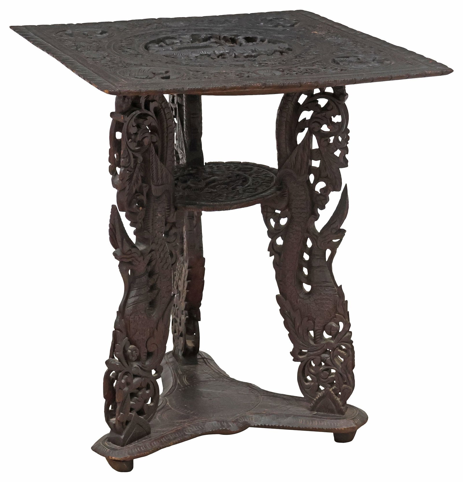 ANGLO-INDIAN CARVED & EBONIZED HARDWOOD TRAY-TOP SIDE TABLE: Anglo-Indian ebonized hardwood occasional table, late 19th c., squared tray top with intricately carved foliate tracery and animal medallions, central roundel with bodhisattvas, raised on beast-form s