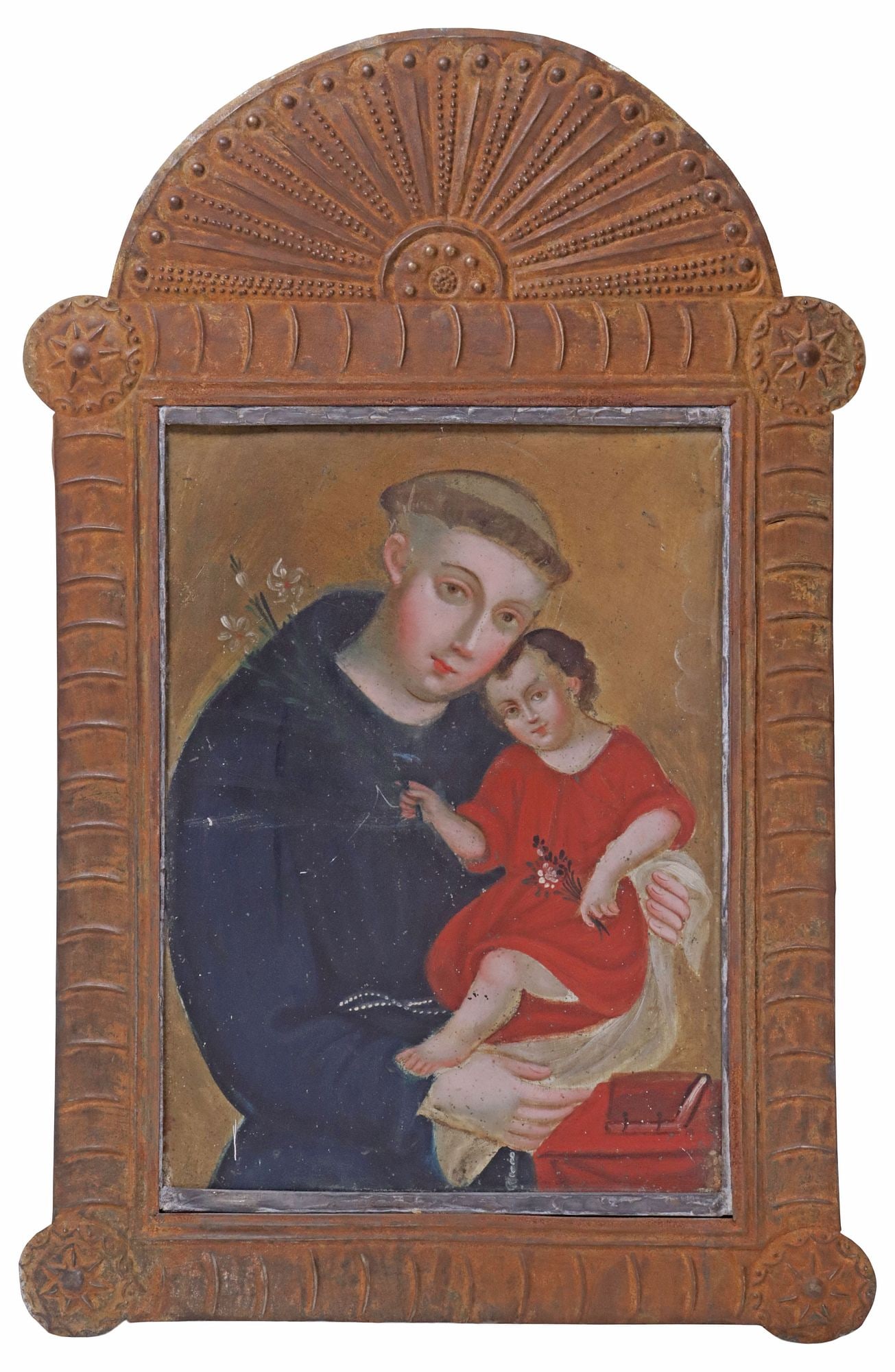 FRAMED OIL ON TIN RETABLO, ST. ANTHONY OF PADUA & CHRIST CHILD, MEXICO: Framed oil on tin retablo, San Antonio de Padua (Saint Anthony of Padua), Mexico, 19th c., depicting the Saint holding the Christ Child, housed in embossed tin nicho/ frame, sight: approx 13"h, 9.5"w,