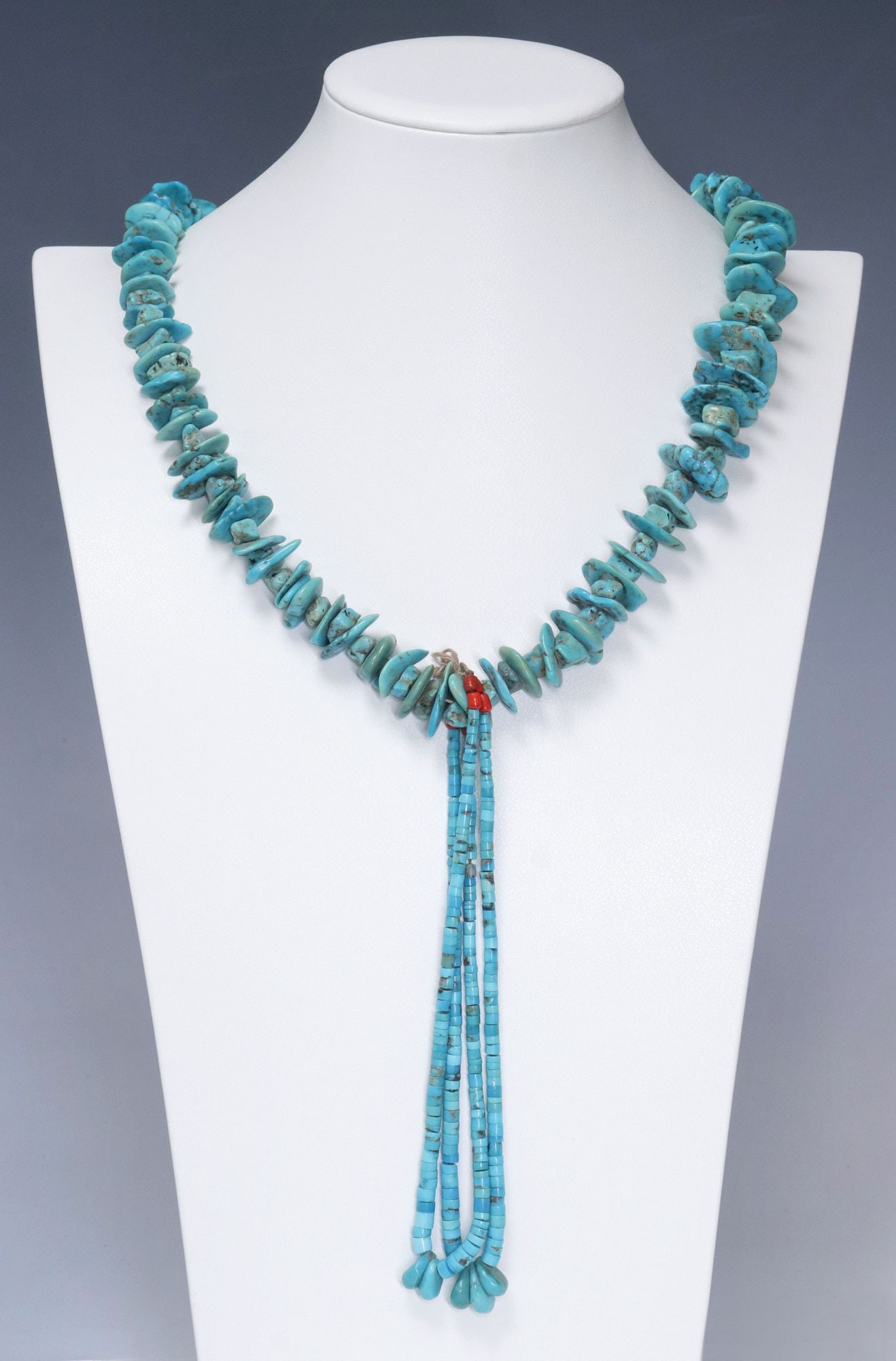 NATIVE AMERICAN PUEBLO BEADED TURQUOISE JACLA NECKLACE: Native American Pueblo beaded Jocla necklace, having graduated turquoise nuggets with shell heishi bead accents, on tied thread, Jocla pendant with tapering turquoise beads, red accent beads, lacking 