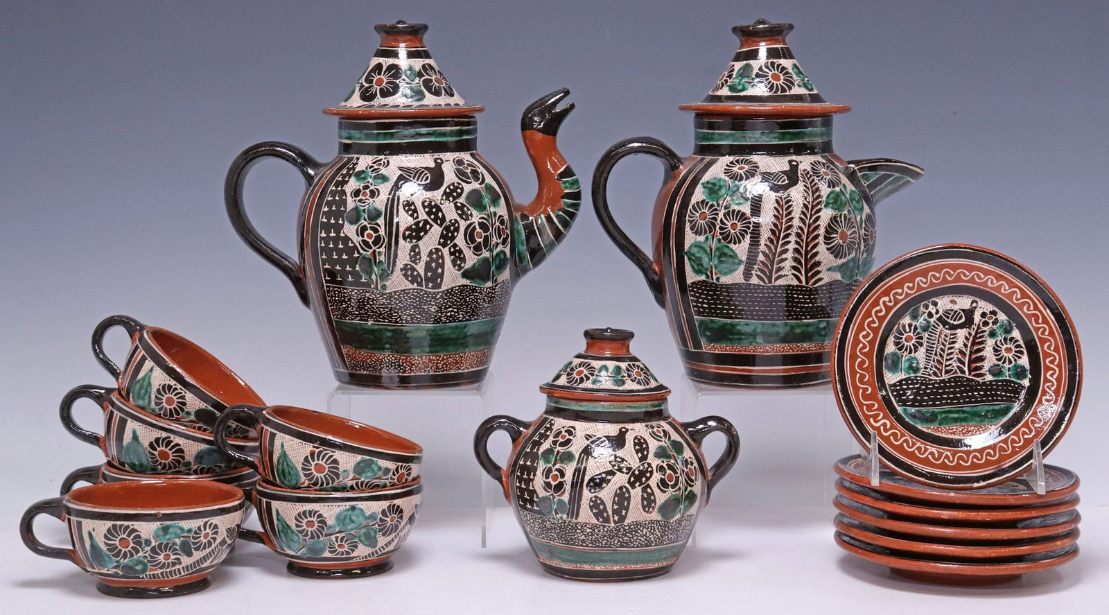 (15) CRUZ BERNABE (20TH C.) TONALA MEXICO PETATILLO TEA & COFFEE SERVICE: (lot of 15) Petatillo pottery tea and coffee set, Cruz Bernabe (Tonala, Jalisco, Mexico, 20th c.), each with foliate and peacock motifs, signed underfoot, including: (6) footed cups, approx 2"h, 5 1/8