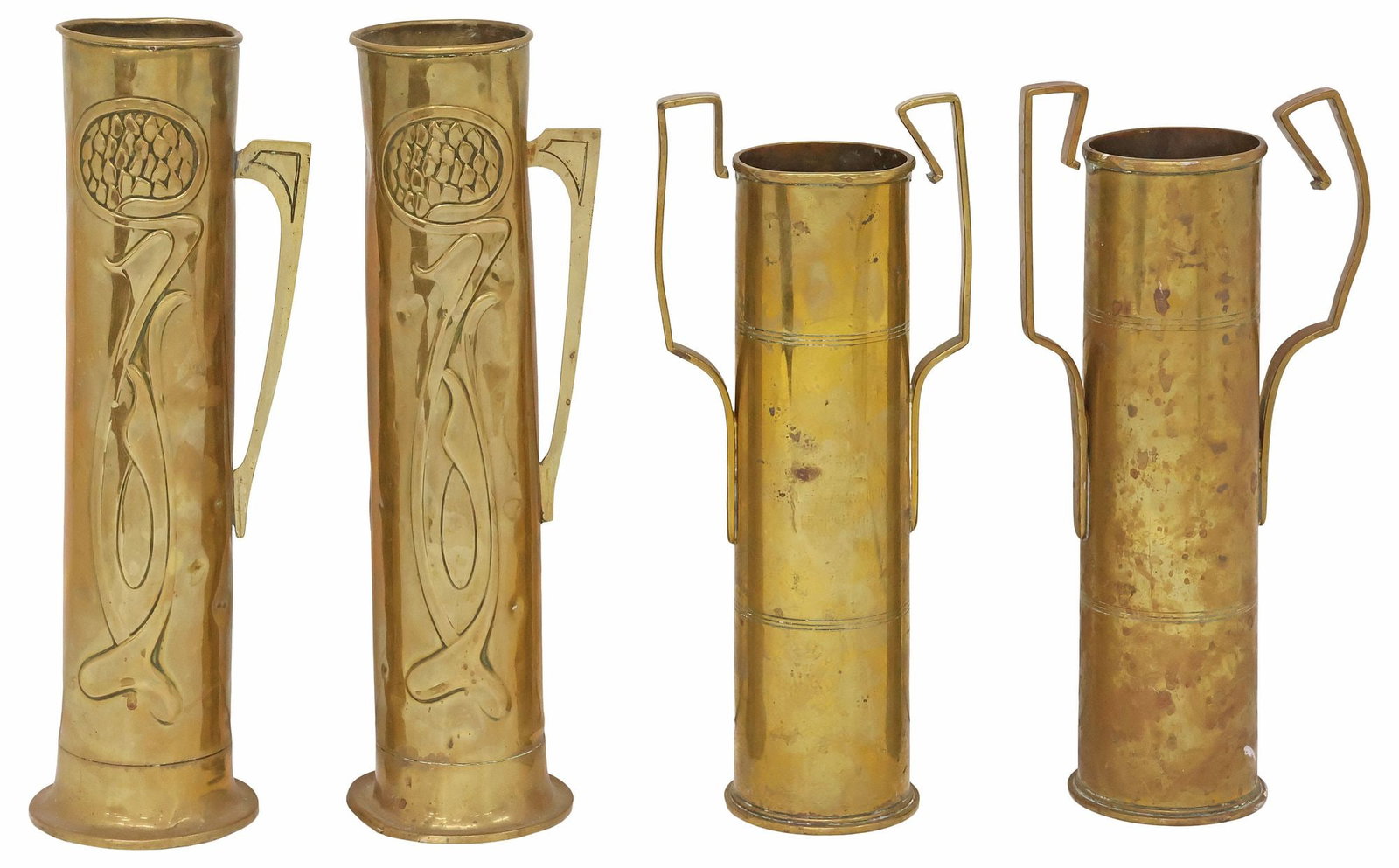 (4) ENGLISH WWII-ERA TRENCH ART ARTILLERY SHELL BEER STEINS: (lot of 4) English WWII-era trench art beer steins, fashioned from artillery shells, in two pairs: including (pair) with chased whiplash scrollwork; (pair) with registers of ribbing; largest: approx 1