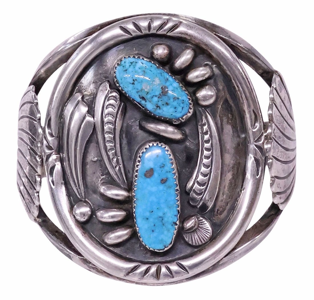 SIGNED J. LONG NATIVE AMERICAN SILVER & TURQUOISE CUFF BRACELET: Native American silver (content unknown) and turquoise cuff bracelet, signed J. Long, possibly Jimmy Long (Navajo/ Dine, 20th c.), two bezel-set turquoise cabochons in a patinated surround, stampwork 