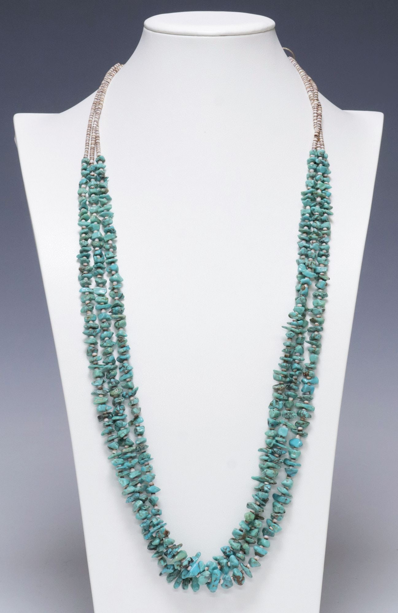 FINE NATIVE AMERICAN TURQUOISE & HEISHI SHELL BEAD 3-STRAND NECKLACE: Fine Native American multistrand beaded necklace, three strands of graduated freeform turquoise stones interspersed with shell heishi beads, on tied cord, approx 31"h, 79.8 grams **Provenance: The Dag